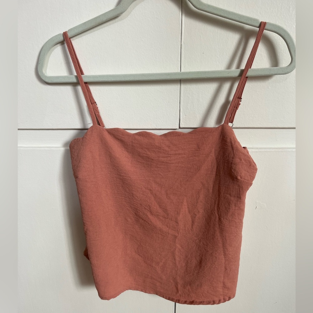 Coral-colored shirt